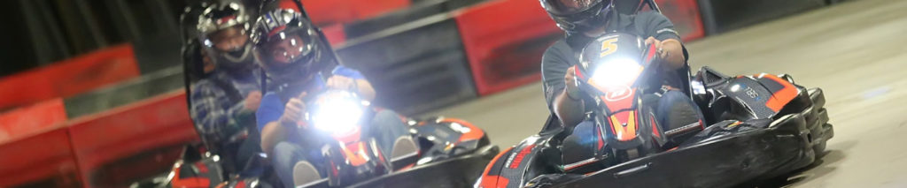 Karts racing around race track in Scottsdale, AZ