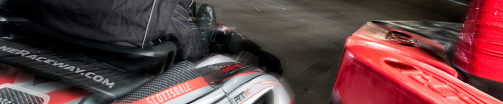 Kart racer going fast around a corner