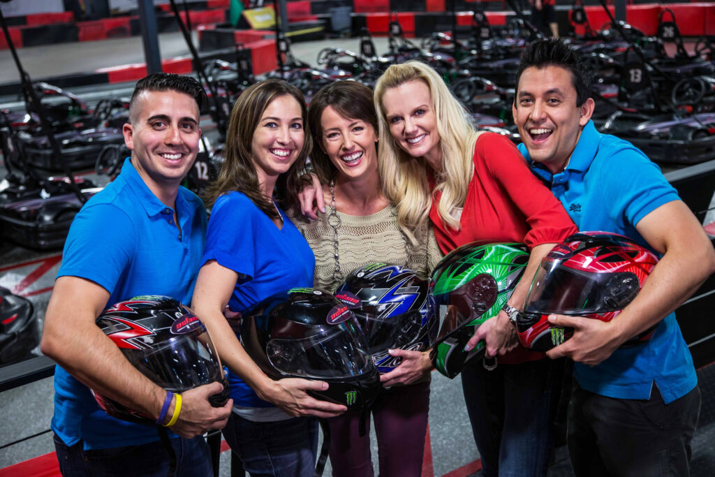 Group holding helmets